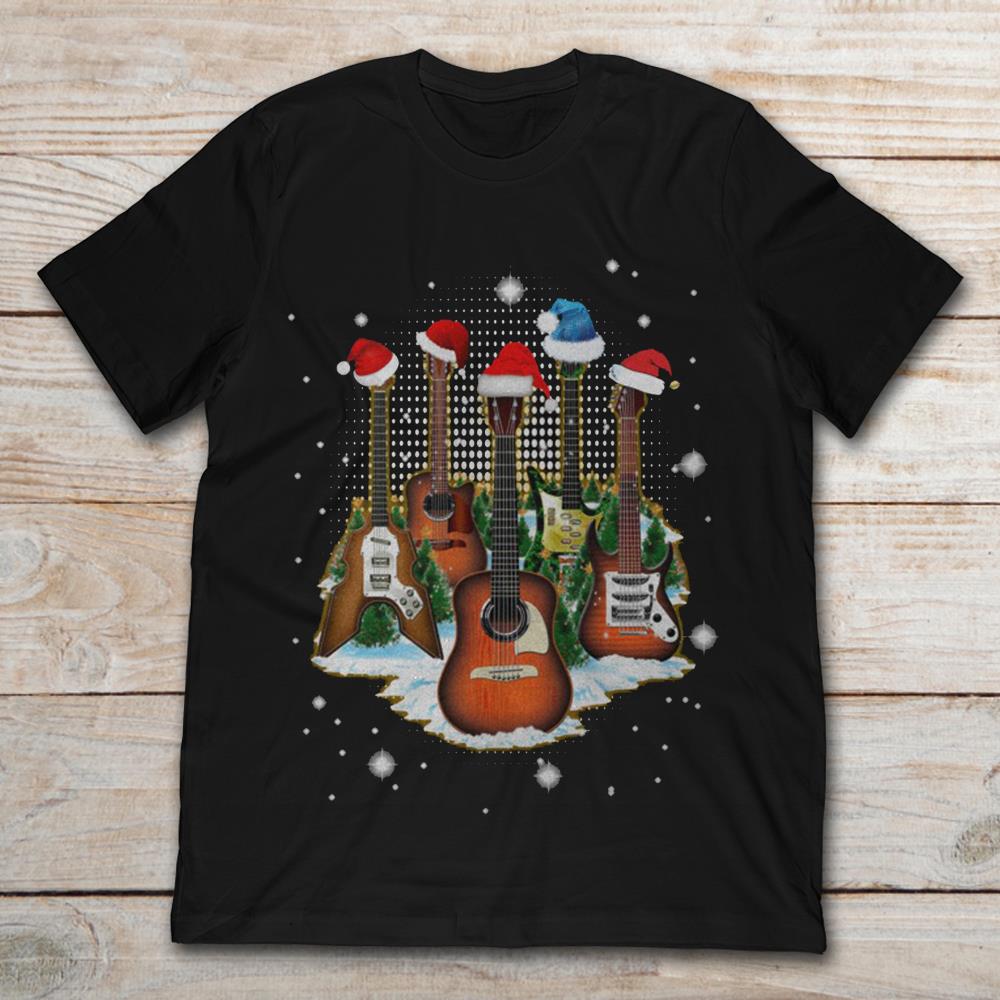 Guitars With Christmas Hat On Snow