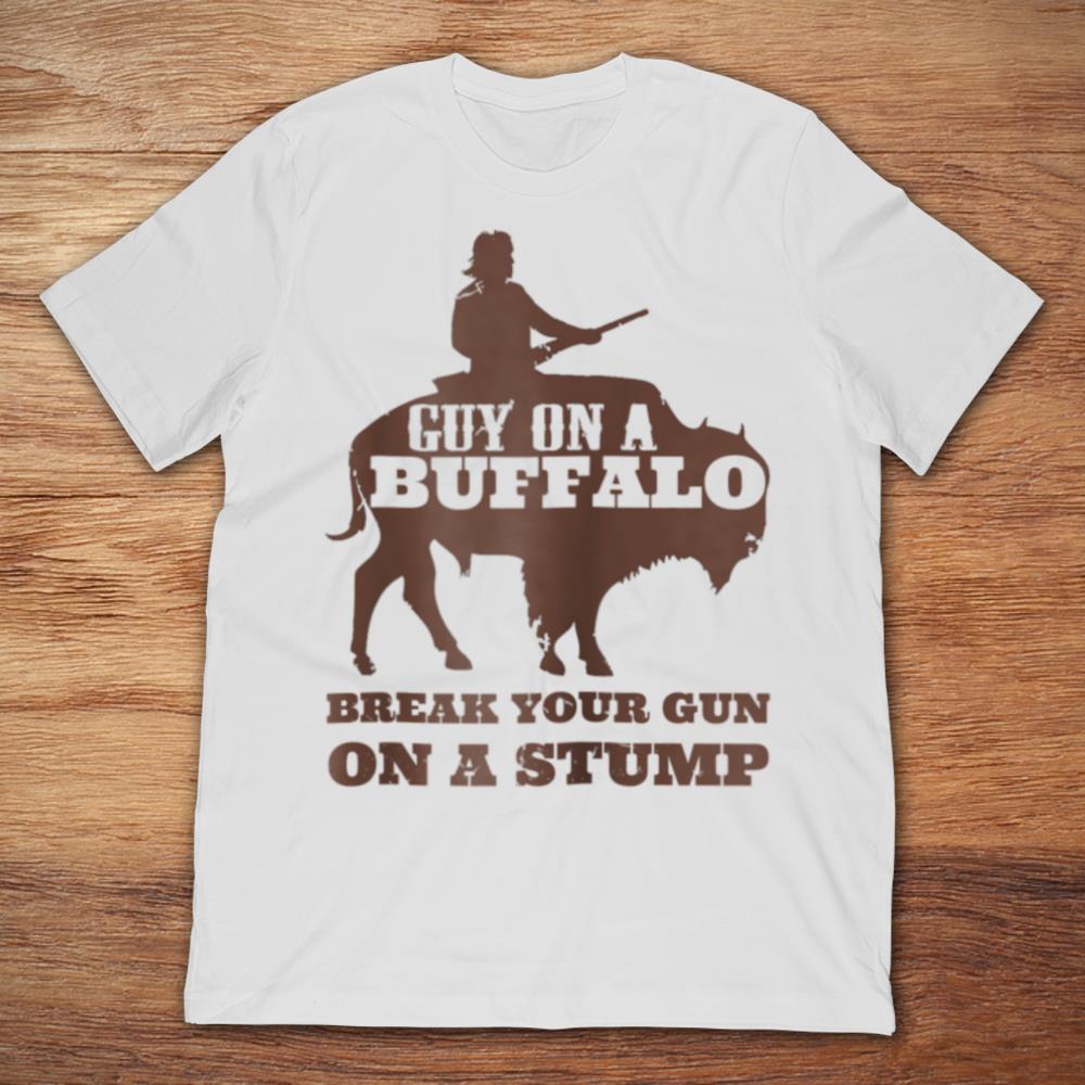 Guy On A Buffalo Break Your Gun On A Stump