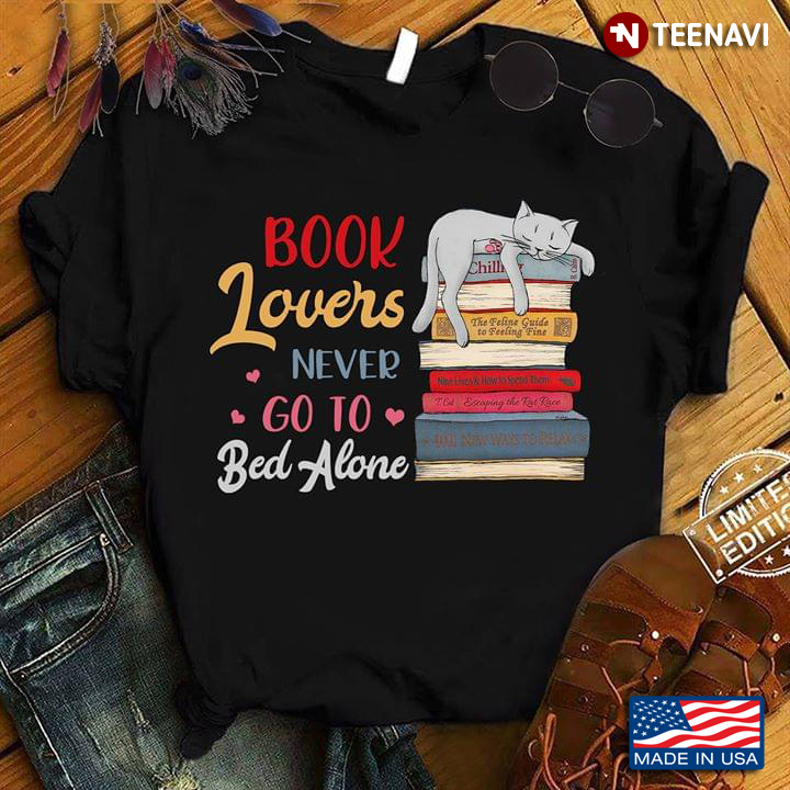 Book Lovers Never Go To Bed Alone A Lovely Cat On Books