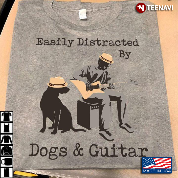 Easily Distracted By Dogs And Guitar Man With Hat Plays Guitar Beside A Dog With Hat