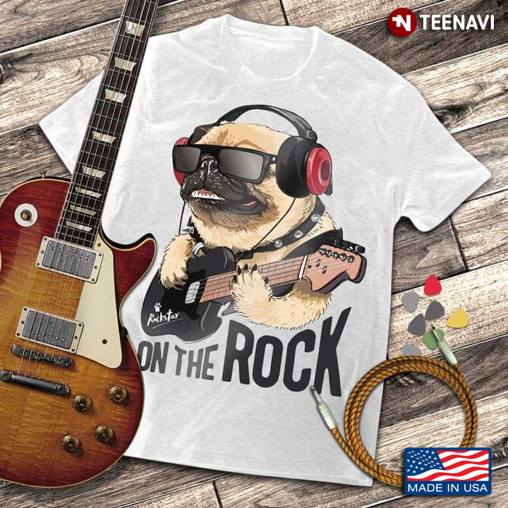 On The Rock Pug Dog With Glasses And Headphones Plays Guitar