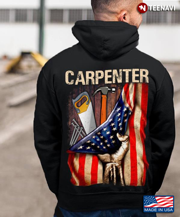 Carpenter Behind American Flag