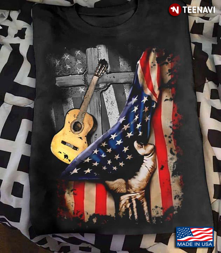 The Cross And Guitar Behind American Flag