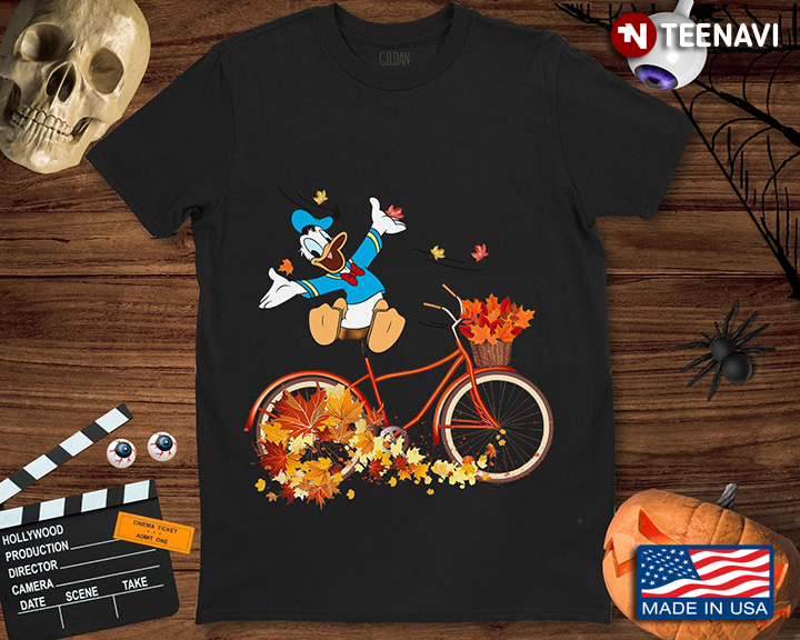 Happy Donald Duck on Bicycle with Autumn Leaves