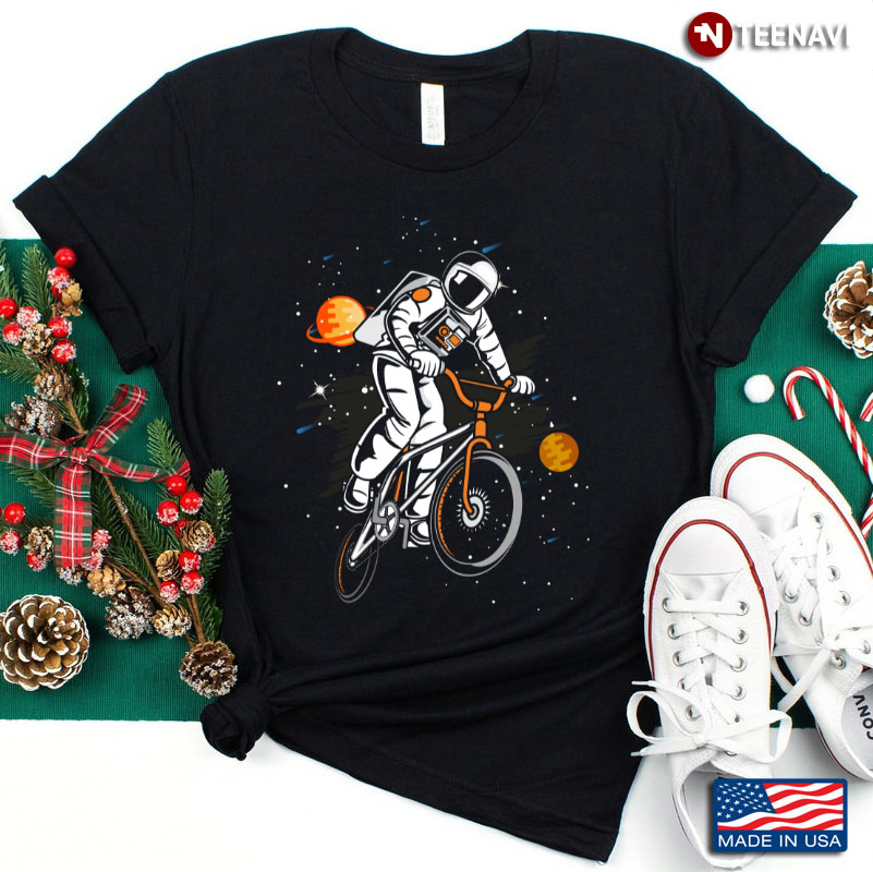 Astronaut Riding Bycicle on Space