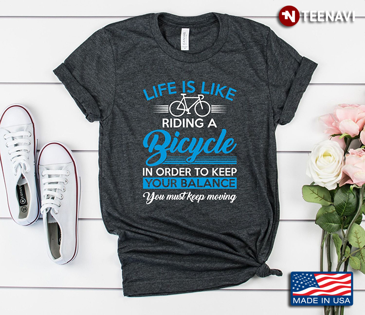 Life Is Like Riding A Bicycle In Order To Keep Your Balance