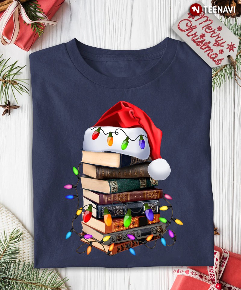 Christmas Bookworm Shirt, Santa Hat On A Pile Of Books
