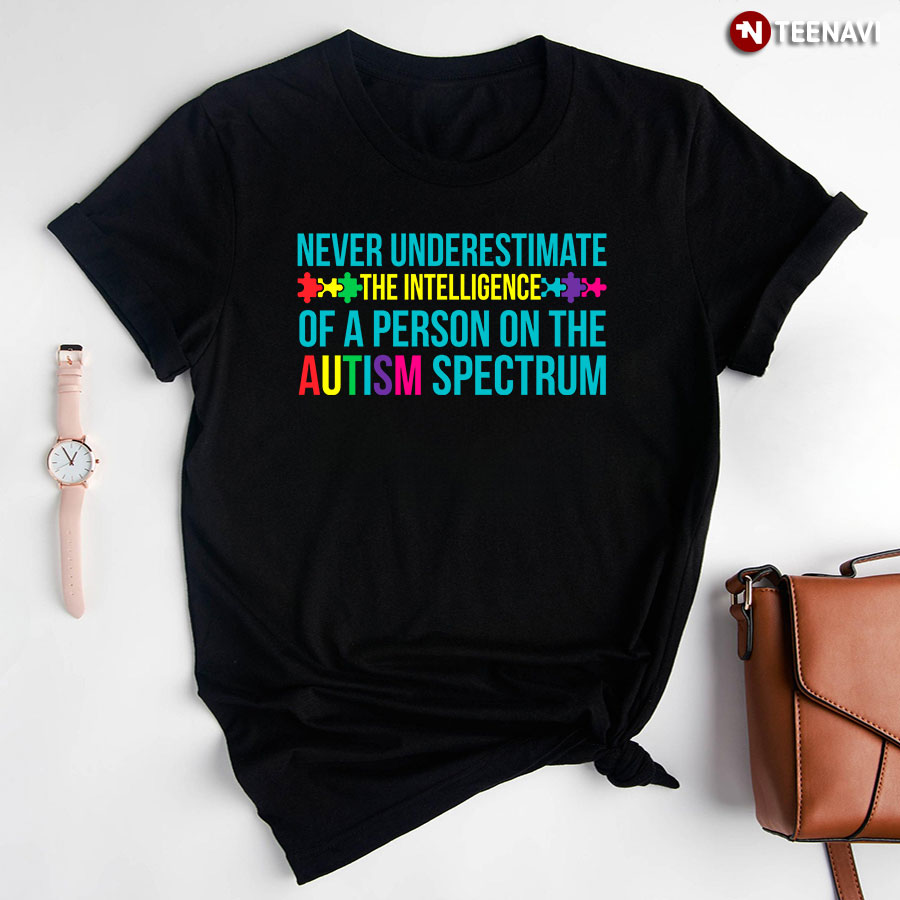 Never Underestimate The Intelligence Of A Person On The Autism Spectrum T-Shirt