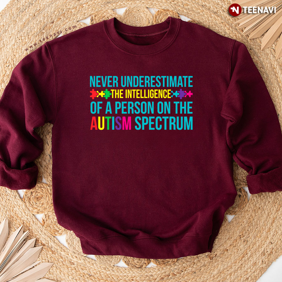 Never Underestimate The Intelligence Of A Person On The Autism Spectrum Sweatshirt
