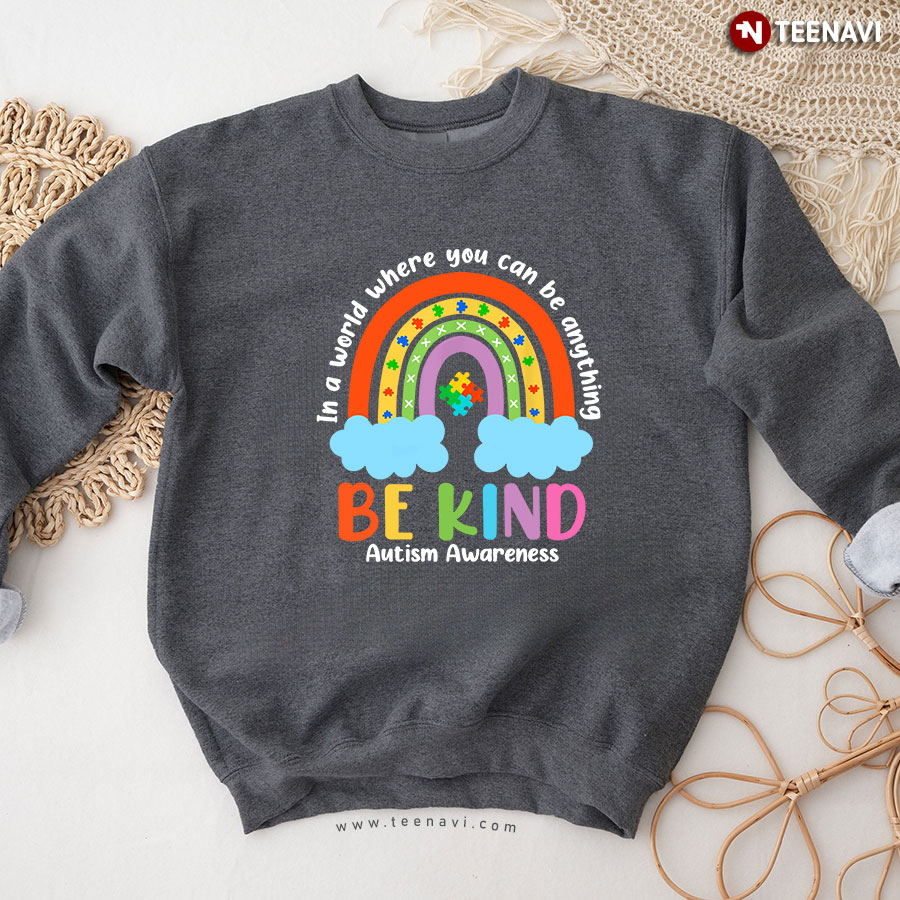 In A World Where You Can Be Anything Be Kind Autism Awareness Rainbow Puzzle Piece Sweatshirt