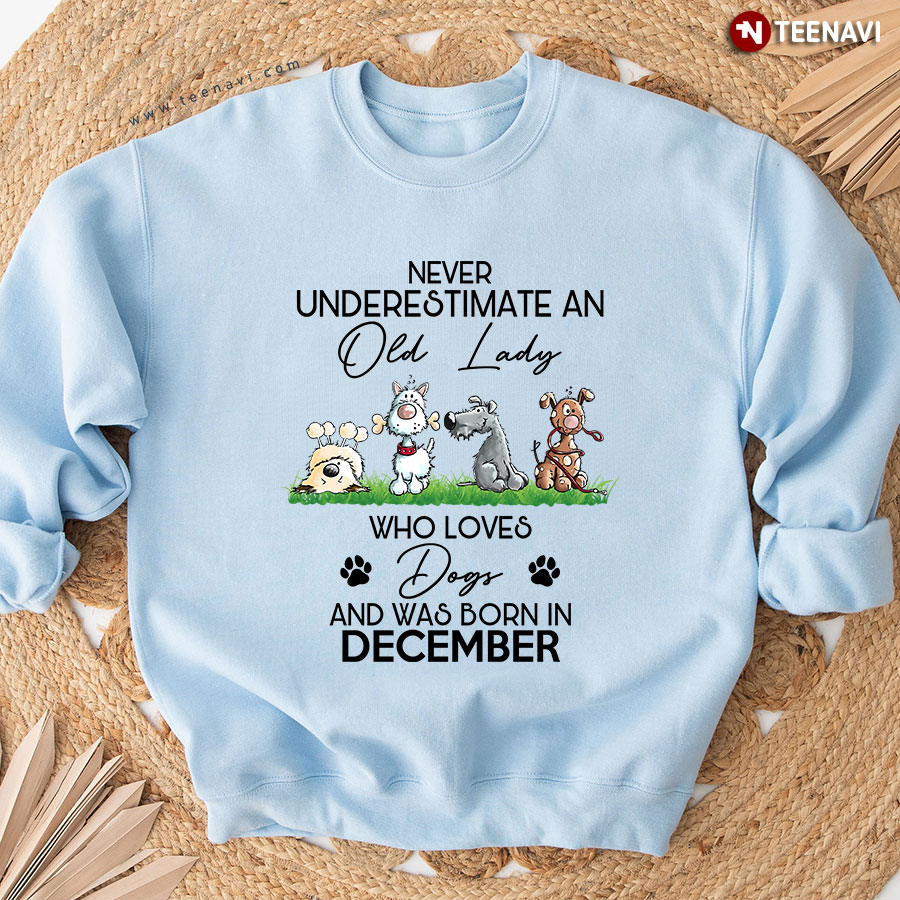 Never Underestimate An Old Lady Who Loves Dogs And Was Born In December Sweatshirt